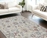 5' X 7' Ivory Floral Bordered Wool Indoor Area Rug