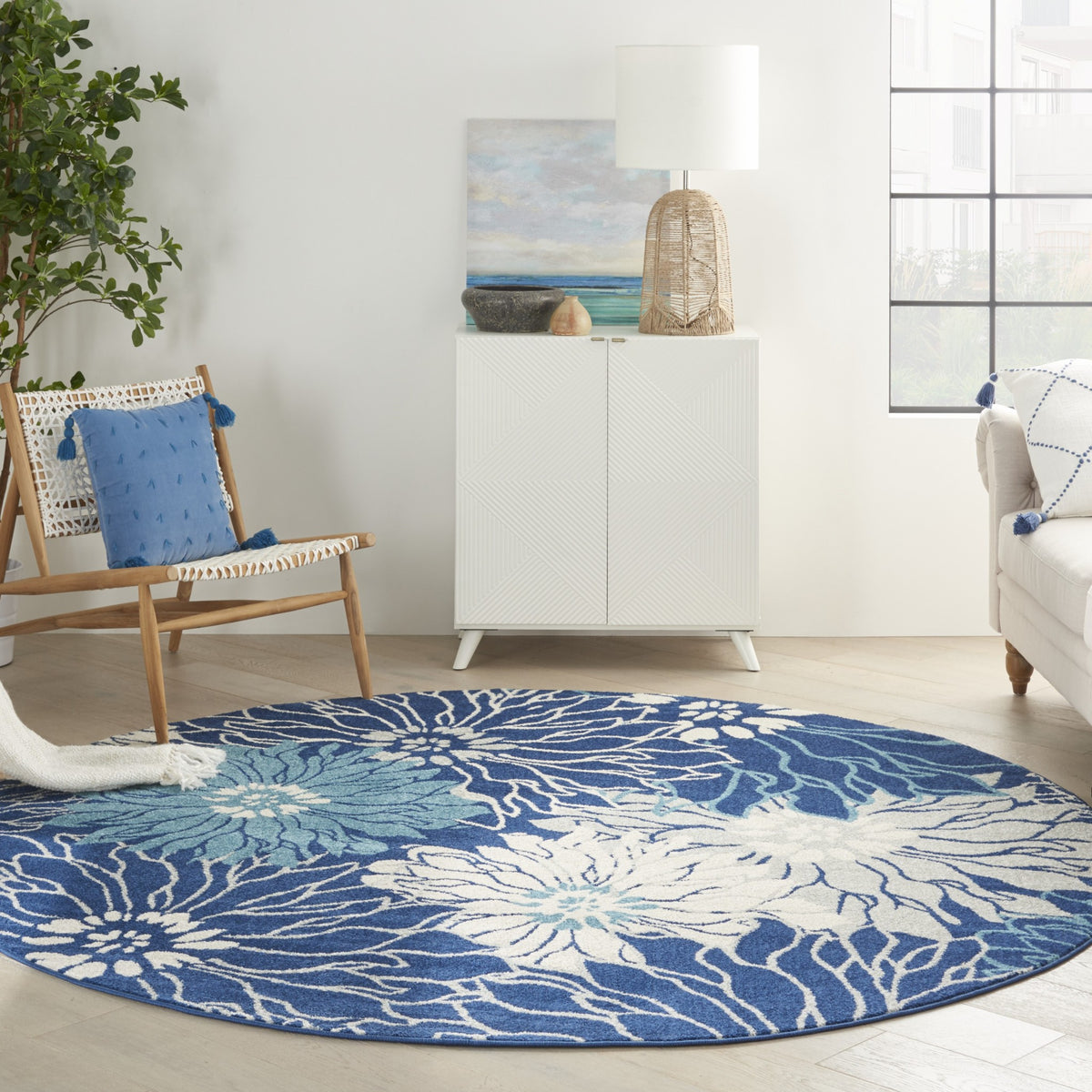 4' Blue And Ivory Round Floral Dhurrie Area Rug