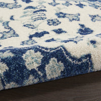 5' X 7' Blue And Ivory Power Loom Area Rug