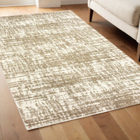 5' X 8' Ivory And Gray Abstract Strokes Area Rug