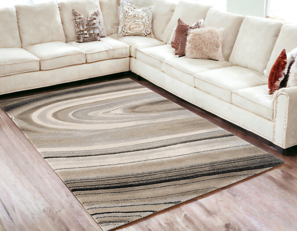 5' X 8' Cream and Tan Abstract Marble Area Rug