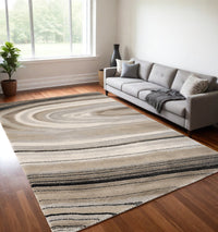 5' X 8' Cream and Tan Abstract Marble Area Rug