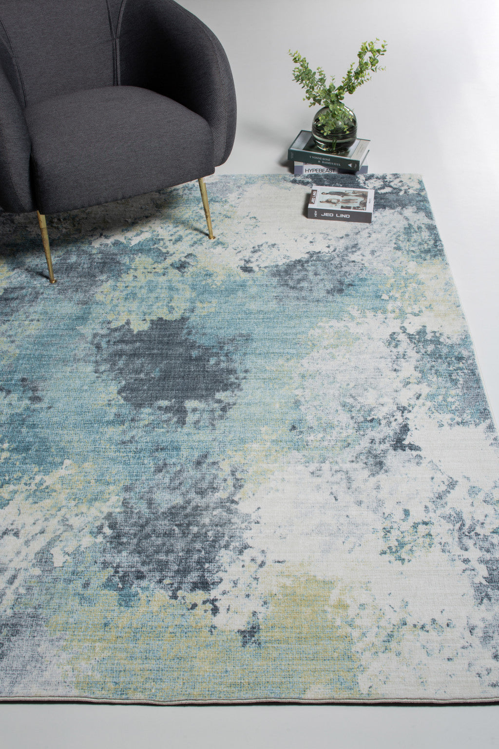 6' x 9' Blue and Ivory Abstract Area Rug